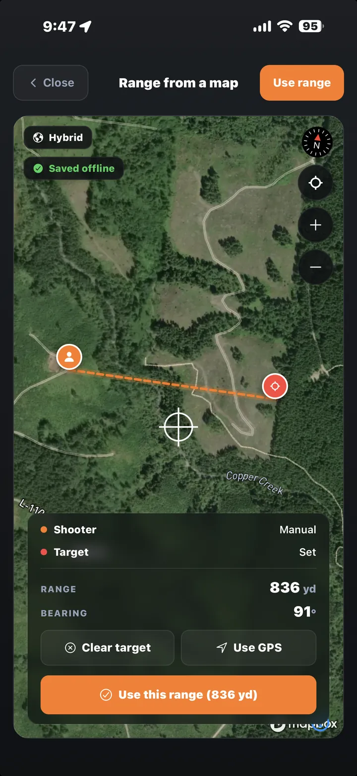 Satellite map with crosshair over a target and the measured distance shown